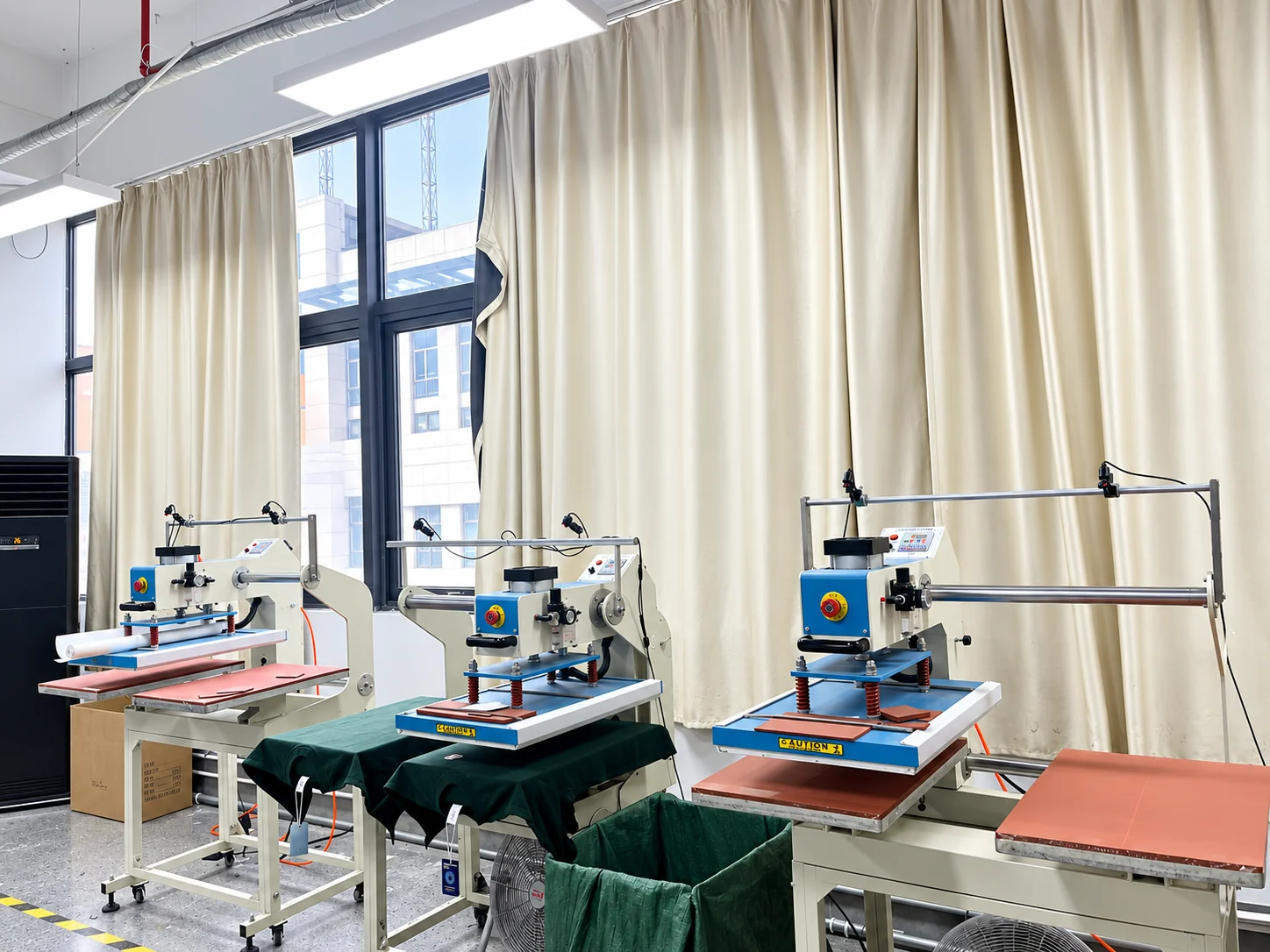 Heat press machines set up for garment decoration.